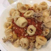 Linguini and Calamari Fra Diavolo · Spicy marinara sauce.