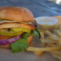 Ted's Chicken Sandwich · Toasted bun with grilled seasoned chicken breast, smoked provolone cheese, hickory smoked ba...