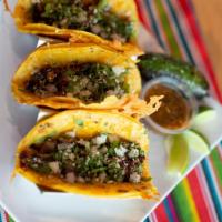 Steak Taco · 3 pieces steak street tacos with onion/cilantro and cheese 
