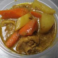 Curry Chicken Meal · A hearty meal prepared with natural chicken, carrots, potatoes, curry, coconut milk, thyme, ...