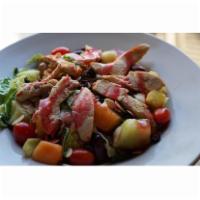 East Coast Chicken Salad   · A medley of chicken, fresh fruit, raisins & toasted almonds over a bed of fresh romaine. Ser...