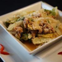 Utica Greens · Fresh escarole sautéed in olive oil, garlic, cherry peppers, Italian sausage & topped with R...