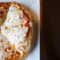Cheese Pizza  · Add topping to this amazing pizza. It's made with our homemade marinara & mozzarella cheese!