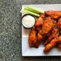 Chicken Wings  · Tossed in one of our homemade sauces or seasoning.