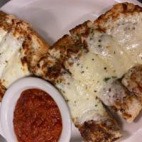 Garlic Bread with Cheese   · Served with Marinara Sauce.