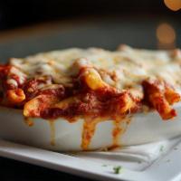 Baked Ziti  · Baked with our house Italian sauce & mozzarella cheese