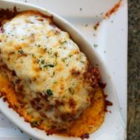 Lasagna · Layered with ricotta cheese, a special blend of meats & topped with mozzarella cheese