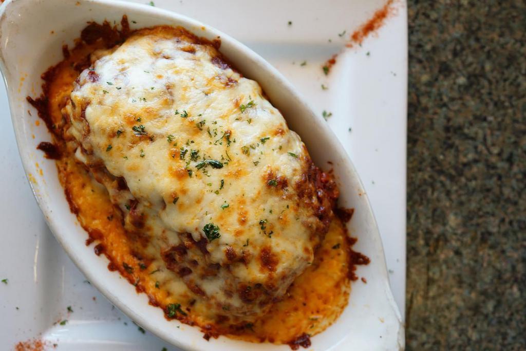 Lasagna · Layered with ricotta cheese, a special blend of meats & topped with mozzarella cheese