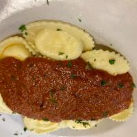 Cheese Ravioli  · Ricotta stuffed ravioli & topped with one of our homemade sauces!
