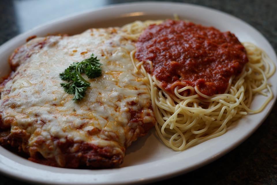 Veal Parmesan · Breaded veal cutlet baked with our house sauce and mozzarella. Choice of side dish.