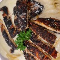 Blackened Chicken Alfredo · chicken blackened with our special seasoning over fettuccini in our homemade alfredo sauce!