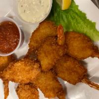 Fried Shrimp · Seven lightly breaded fantail shrimp. Choice of side dish.