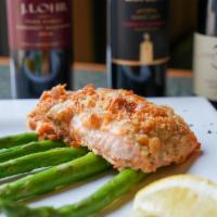 Dijon Crusted Salmon · Grilled crusted herb salmon topped with a fresh herb dijon cream sauce. Served with asparagus.