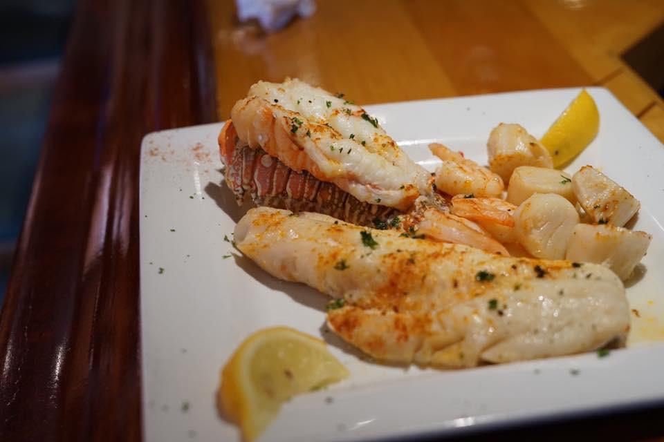 Broiled Seafood Platter · Haddock, scallops, shrimp and 5 oz. lobster tail. Choice of side dish.