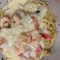 Shrimp and Crab Alfredo · Shrimp and crab tossed in our homemade Alfredo over fettuccini.