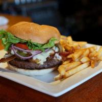 The Ultimate Burger   · Loaded with cheese, bacon, onions, peppers & mushrooms. Comes with lettuce, tomato & onion.