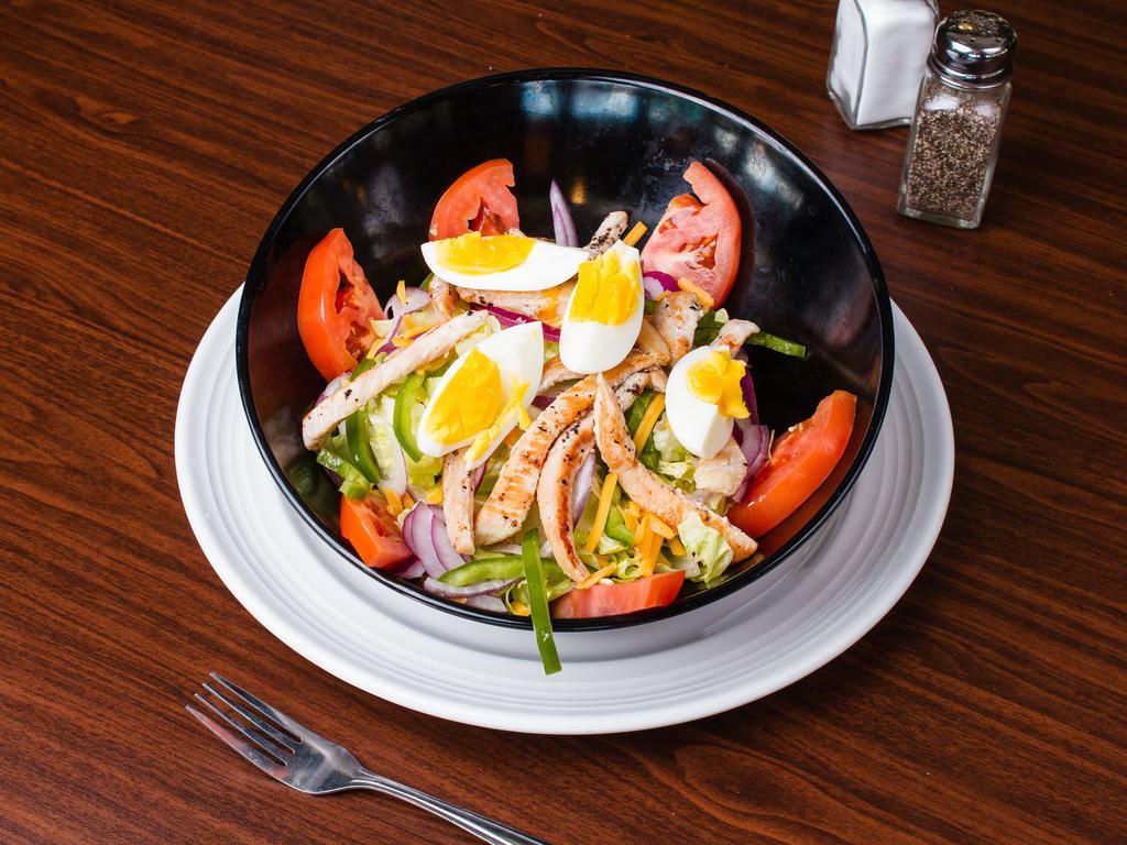 Greek Salad · Tomatoes, cucumber, olives feta and vinaigrette. Add grilled chicken for an additional charge.