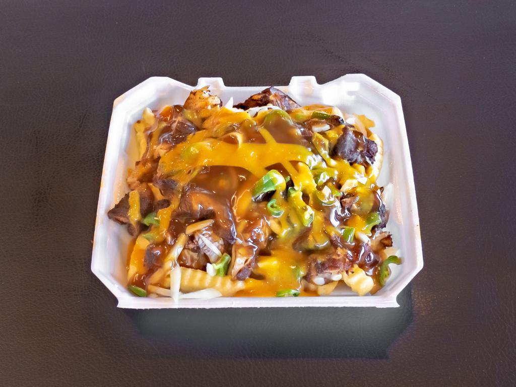Junk Fries Meal · Our tender rib tips cut into tiny chunks, sitting on a bed of fries.  Covered with our highly requested Bourbon/Whiskey Sauce and Smoked Mustard sauce!