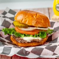 6 Oz Angus Beef Burger Combo · 6oz Beef Burger topped with white American cheese, lettuce, tomatoes, raw onions, pickles, k...