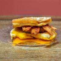 Breakfast Waffle Sandwich · Freshly made waffle with bacon, egg, sausage, and American cheese. Add a side of hashbrowns ...