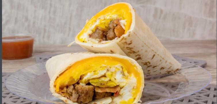 Meat Lover's Breakfast Burrito · Our delicious breakfast burrito is made with bacon, sausage, egg, and American cheese. Your choice of only bacon or sausage. Add a side of hash browns for an additional charge.