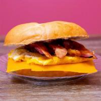 Bacon, Egg, & Cheese Bagel  · This plain bagel is made with 3 slices of bacon, 2 eggs, and American cheese.