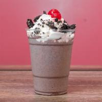 Cookies and Cream Ice Cream Malt · Ice cream malt made with Oreo cookies, topped with whipped cream and cherry.
