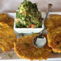 Tostones con Guacamole · Fried green plantains with Avocado sauce (guacamole)