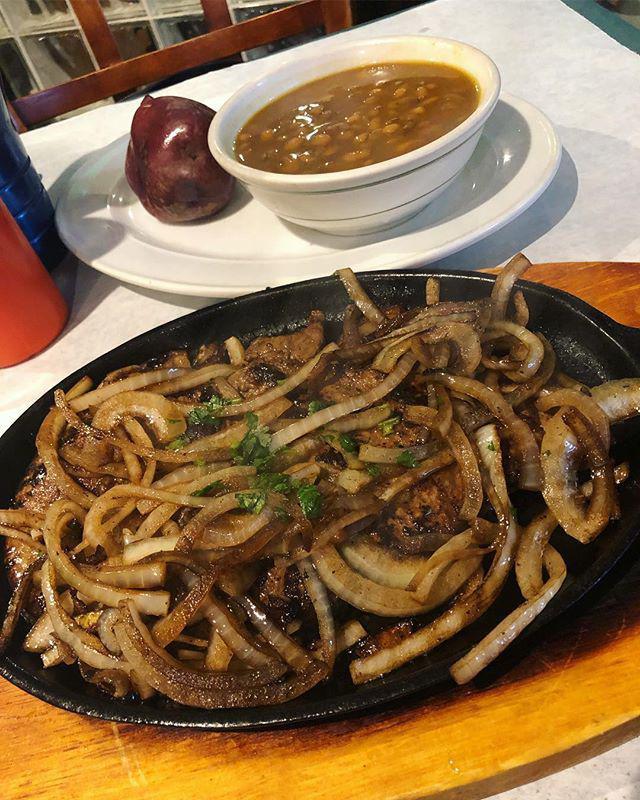 Bistec Encebollado · Top round steak with onions. With two side order