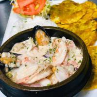 Ceviche Mixto en Salsa Rosada. · Mixed ceviche In home pink sauce. Served with rice and fried green plantains
