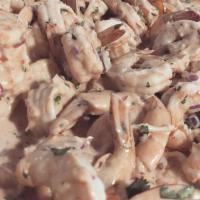 Ceviche De Camarones con Tostones · Shrimp ceviche with fried green plantain and rice