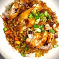 Chinese Style Chicken over Fried Rice · Chinese style fried chicken over fried rice.