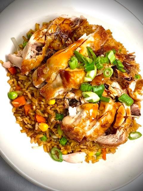 Chinese Style Chicken over Fried Rice · Chinese style fried chicken over fried rice.