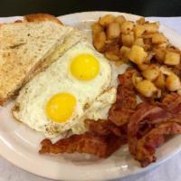 2 Eggs any Style with Bacon · Served with homefries and toast.