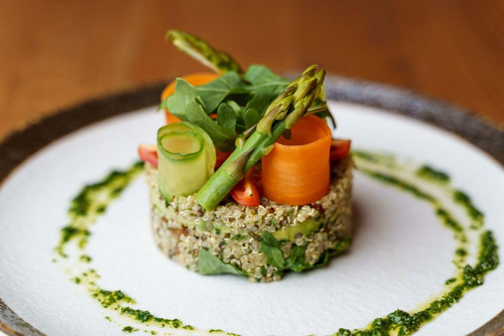 Quinoa Salad  · Quinoa, seasonal greens, walnut, avocado, fresh herbs and extra virgin olive oil.