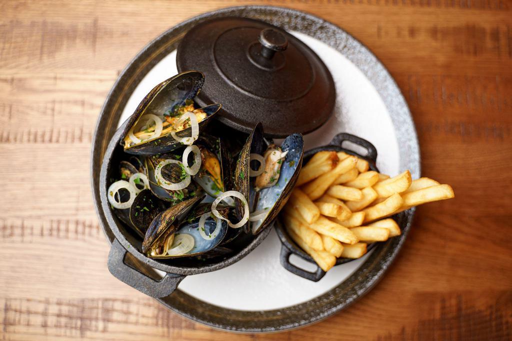 Moules Mariniere   · P.E. I steamed mussels, white wine, shallots, parsley, french fries.