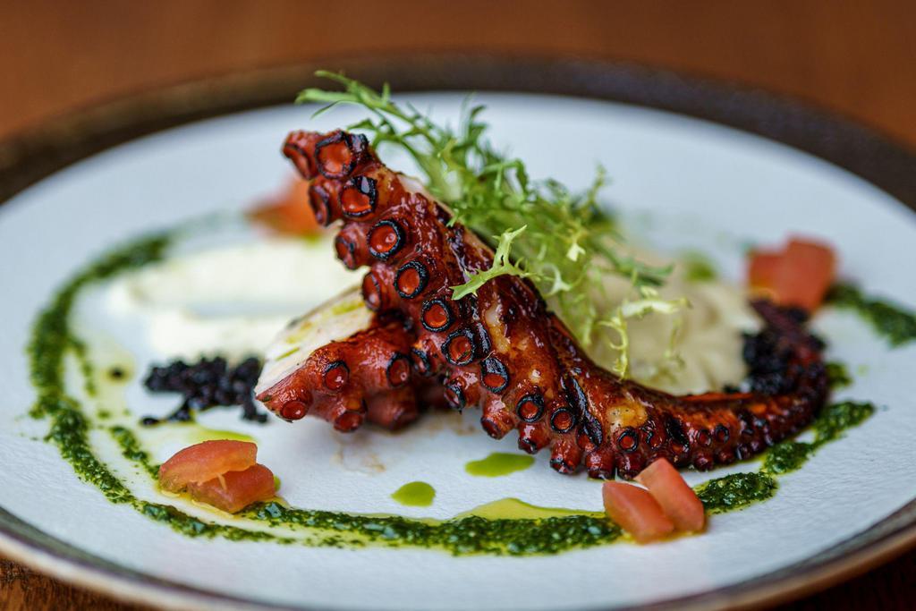 Grilled Octopus	  · Char grilled octopus, mashed potato, rocket pesto, extra virgin olive oil and tomato concasse.