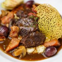 Beef Bourguignon · Slow-cooked beef in a red wine sauce  with pearl onions & cripsy bacons . Served on homemade...