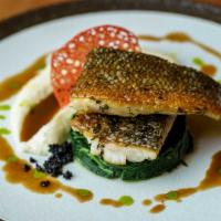 Seabass · Fillet of Mediterreanean  sea bass served with a pure of mash potato, sauteed baby spinach w...