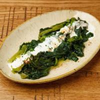 Sauteed Spinach  · Fresh spinach sauteed with garlic & olive oil.Topped with yogurt sauce & herbs


