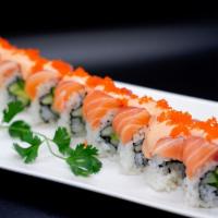 Rock'n Roll · Avocado, cucumber, topped with salmon, tuna, spicy sauce, masago.