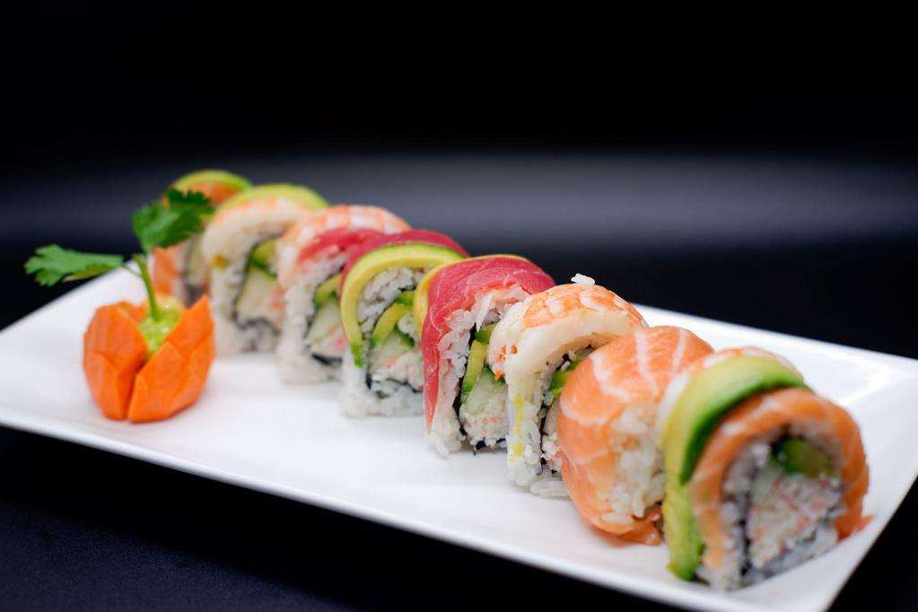 Rainbow Roll · Crab salad, avocado, cucumber, topped with salmon, tuna, shrimp, avocado.