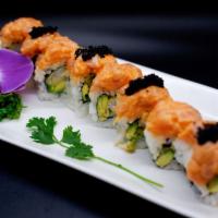 Tiger Roll · Shrimp tempura, spicy tuna, topped with salmon, black tobiko.