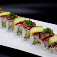 Tataki Roll · Crab salad, avocado, cucumber, topped with pepper tuna, avocado, ponzu, green onion.