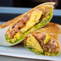 The Spud Breakfast Burrito · Fluffy scrambled eggs with our signature diced potatoes, shredded cheese, sour cream and sal...