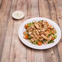 Grilled Chicken Caesar Salad · Our Caesar salad topped with grilled chicken.