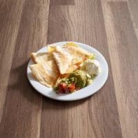 Cheese Quesadillas · Grilled tortillas with cheddar, Jack cheese and chipotle ranch. Served with sour cream, guac...