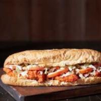 Buffalo Chicken Sub · Breaded chicken, hot or mild sauce, tomatoes, Wisconsin cheese blend and ranch dressing.