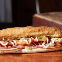 Club Sub · Loaded with ham, turkey, bacon, Wisconsin cheese blend, lettuce, tomatoes and mayo.