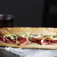 The Godfather Sub · Ham, turkey, pepperoni, salami and Wisconsin cheese blend piled high with lettuce, tomatoes,...